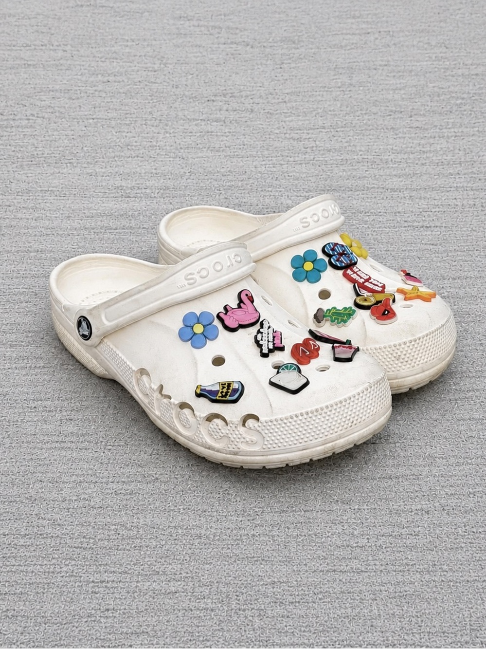 CROCS White with Colorful Charm Accents
Unisex men size 7 and women 8